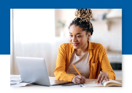 A woman is working with her laptop.